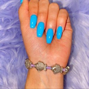 Vintage Silver Fish Charm Purple Threaded Bracelet